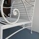 Robust wrought iron armchair