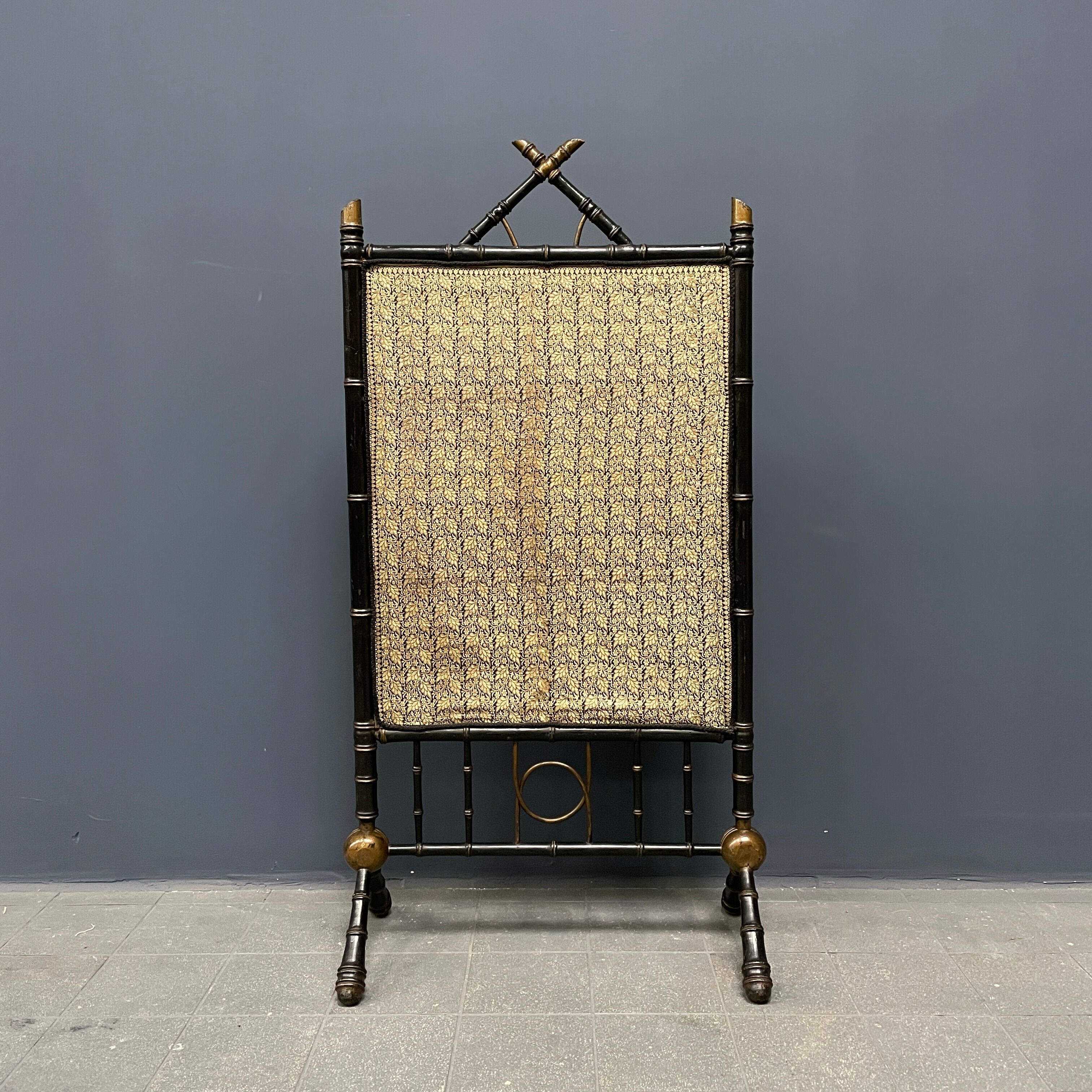 Antique black and gold faux bamboo fireplace screen