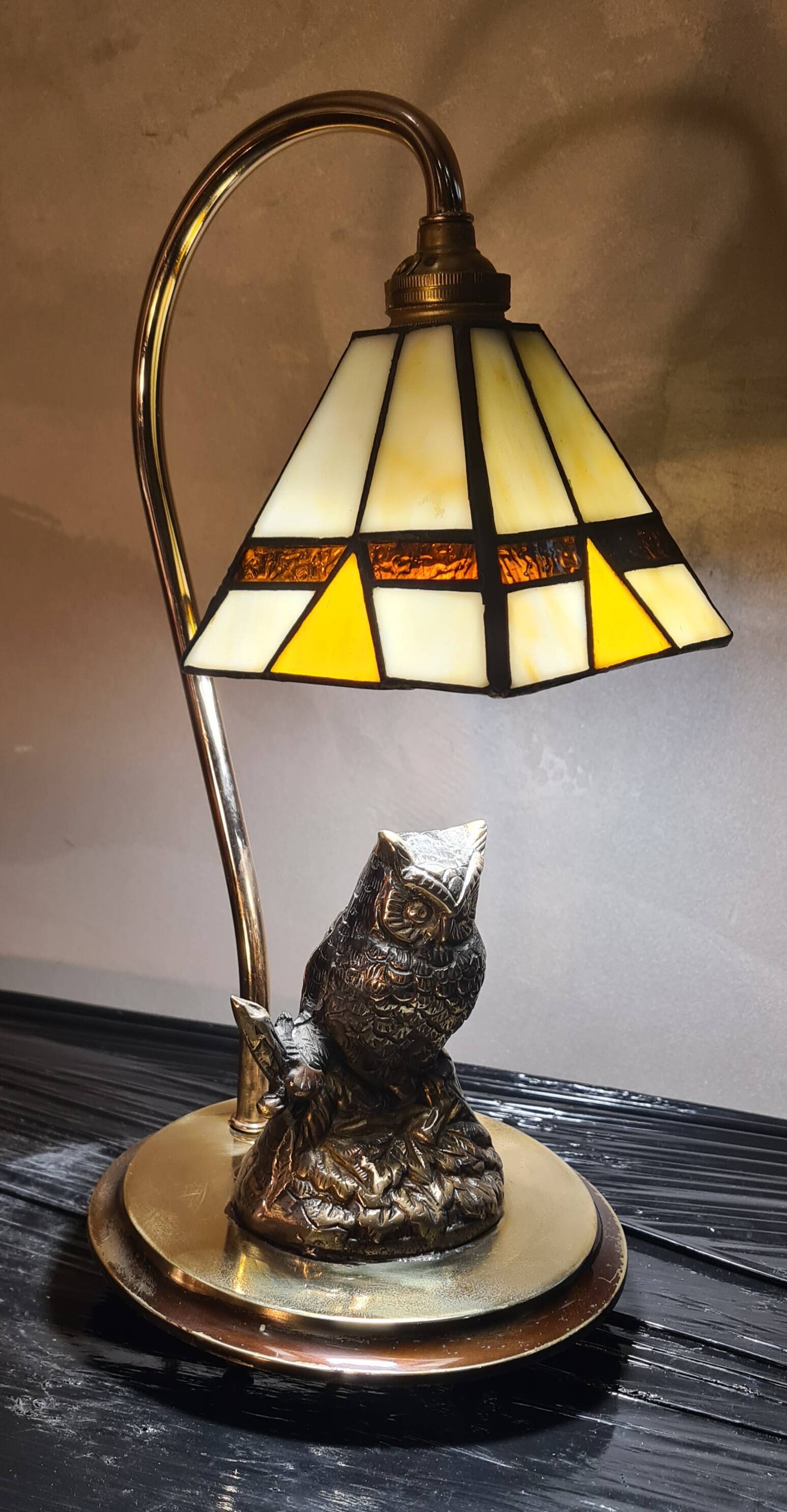 Owl-shaped designer bedside lamp, solid bronze owl with glass lampshade