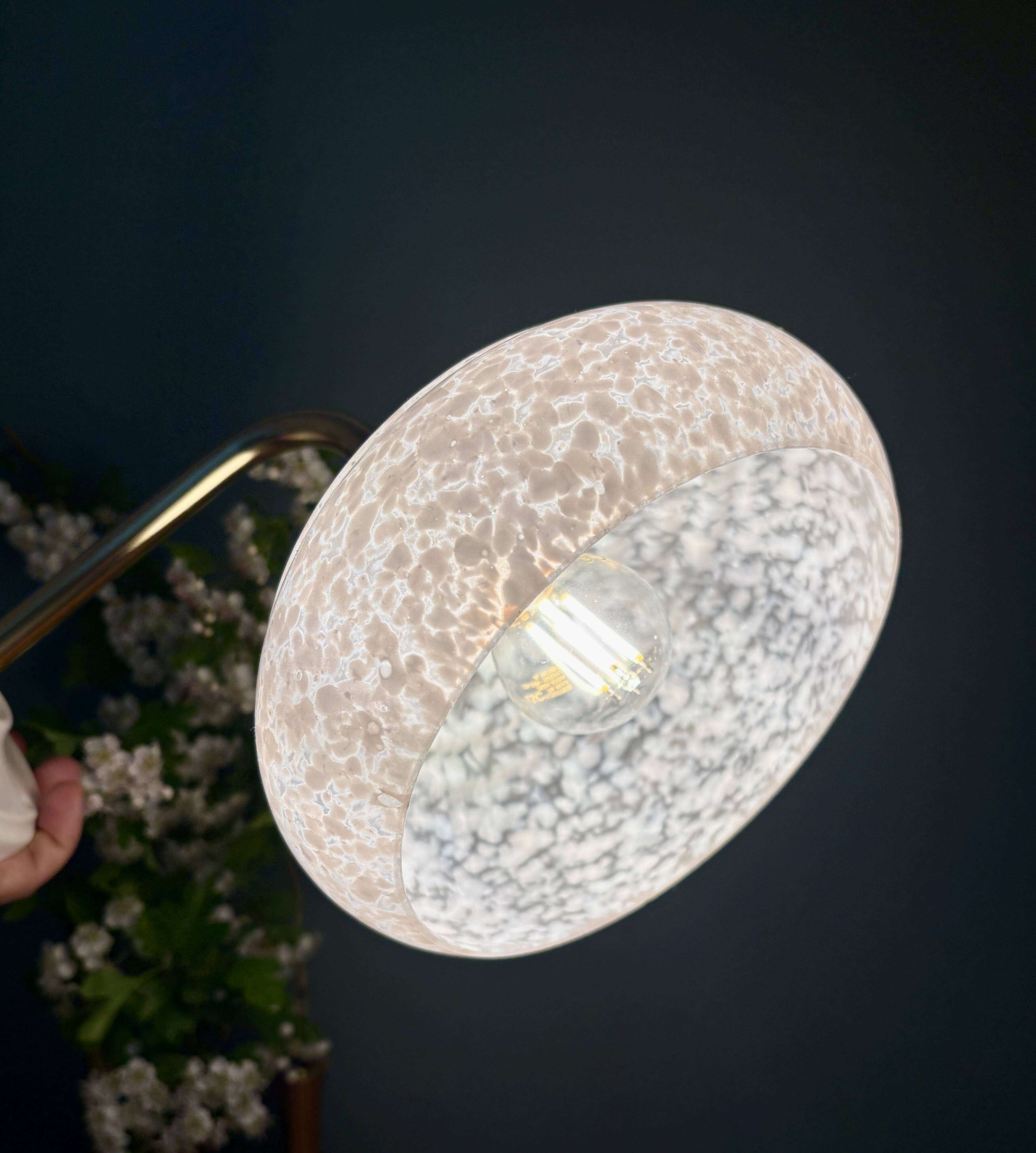 Vintage glass wall lamp with a white Clichy shade.