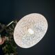 Vintage glass wall lamp with a white Clichy shade.