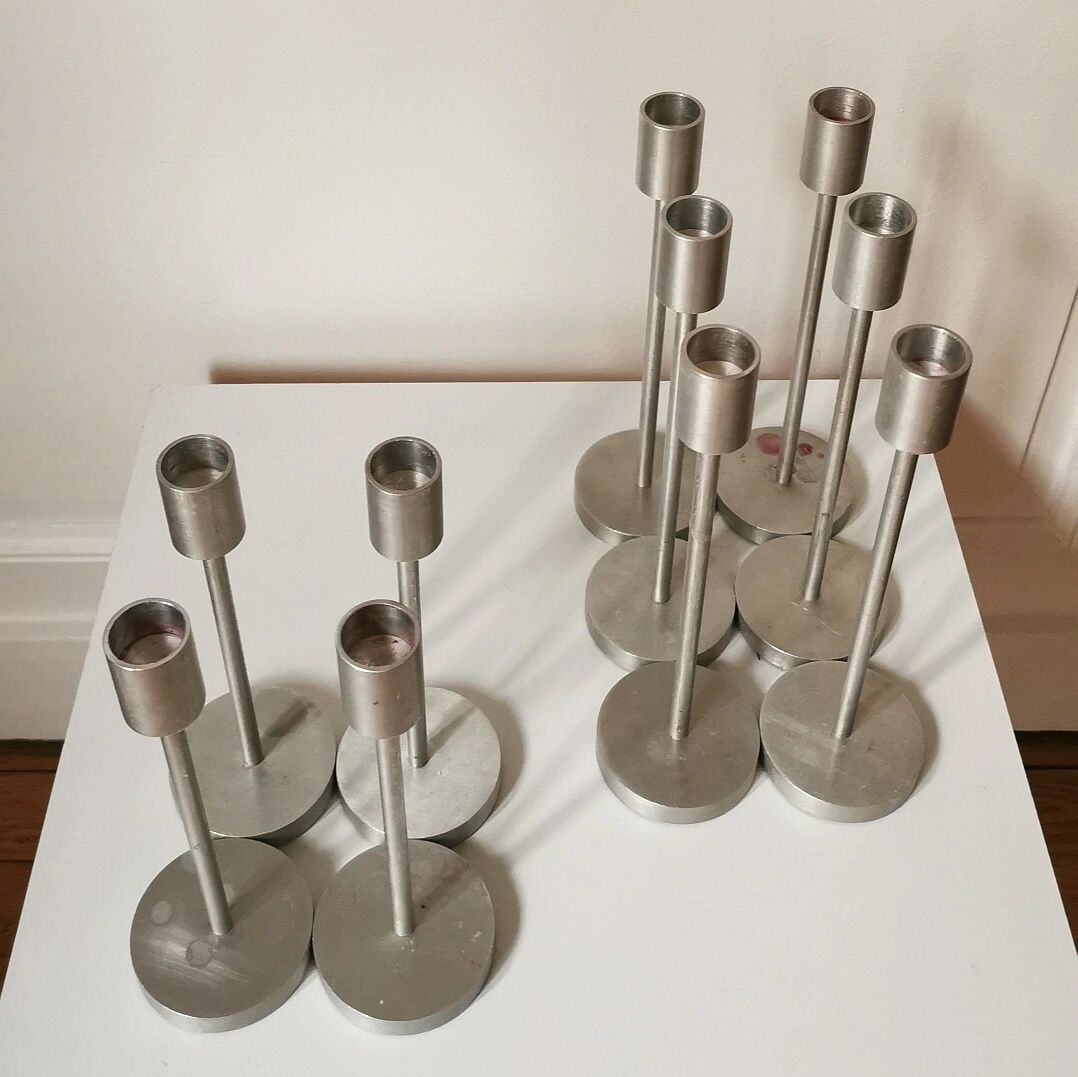 Set of 10 aluminium candle holders.