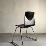 7 Pagholtz tubular steel stackable dining chairs | West Germany | 1960s