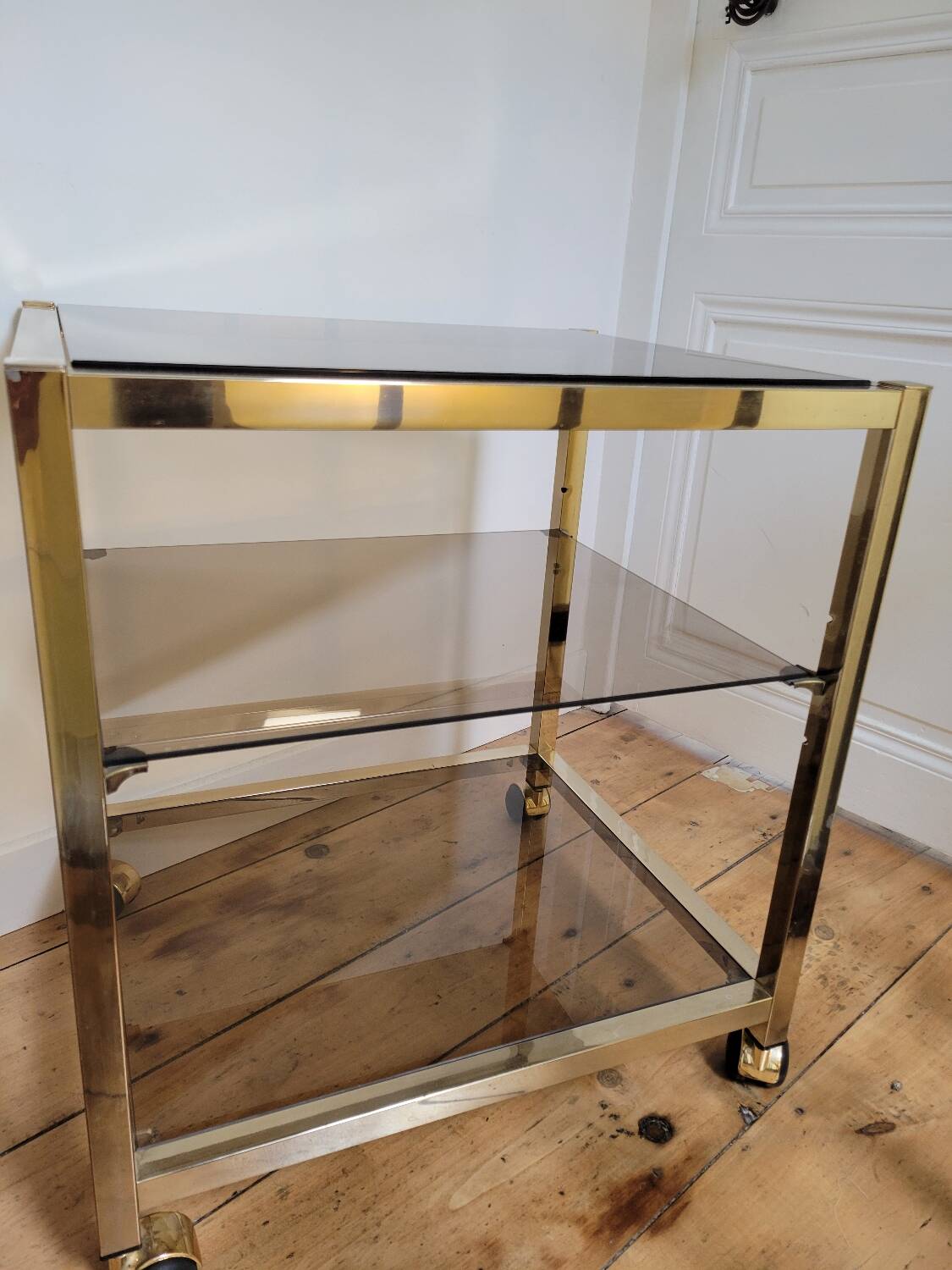 Gold metal and smoked glass serving trolley
