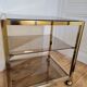 Gold metal and smoked glass serving trolley
