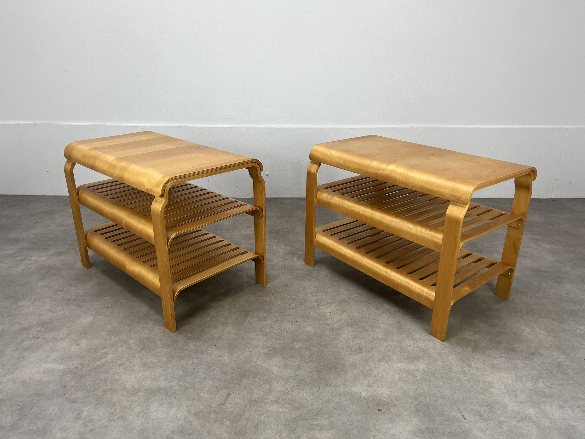Pair of curved wooden entrance benches 1980