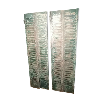 Lot of old green shutters in 4-part iron screen headboard