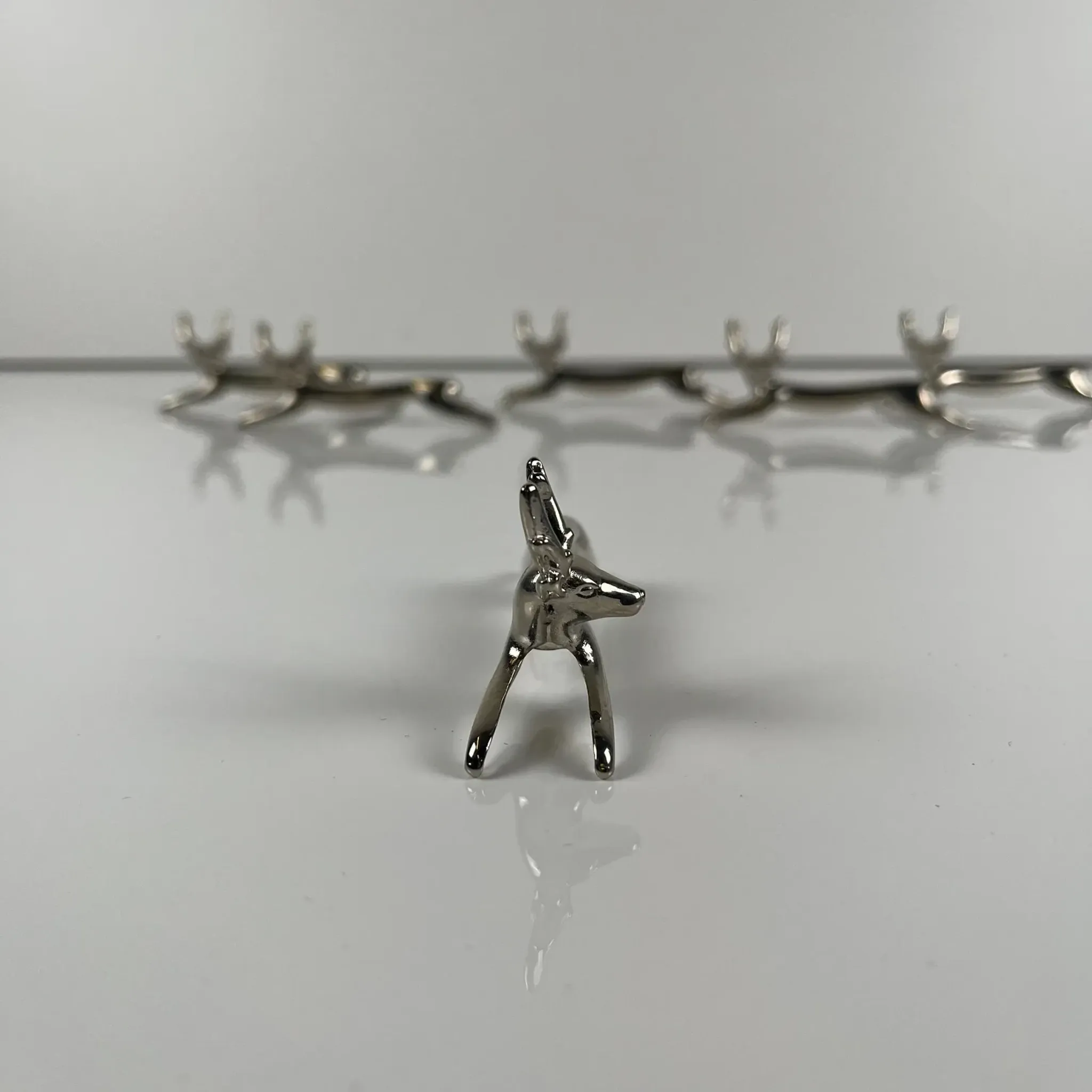 Set of 6 metal knife rests, "Deer / stag" model, 1980-90.