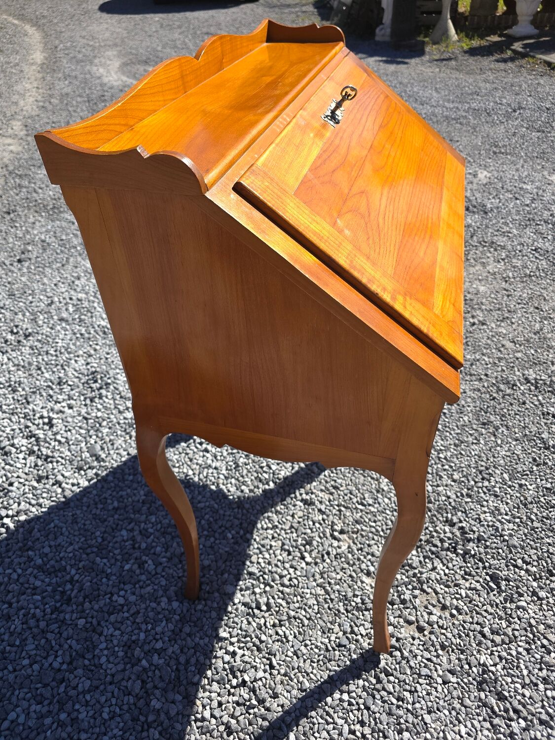 Cherry wood slant-top desk