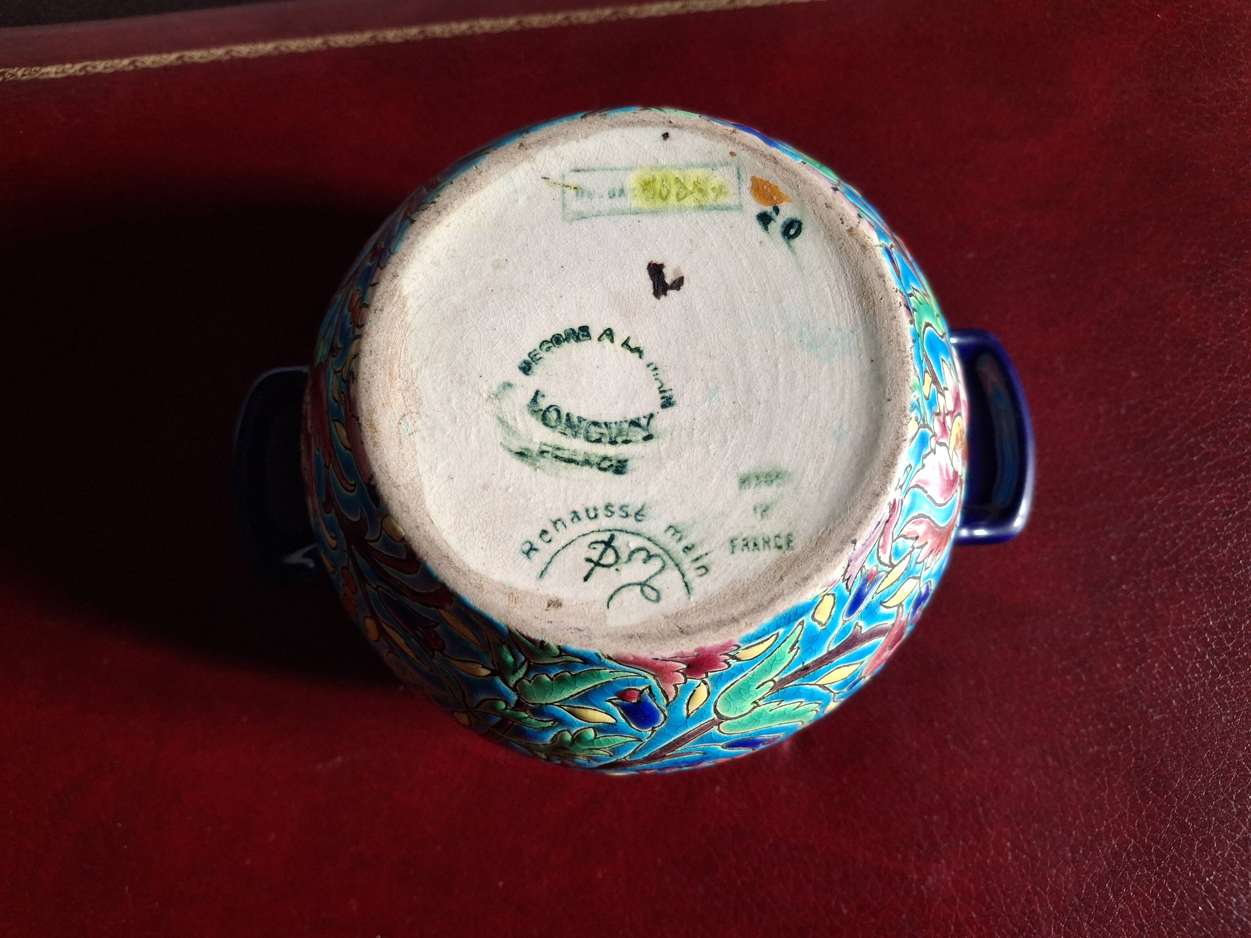 Cloisonné enamel tea service from Longwy in excellent condition.