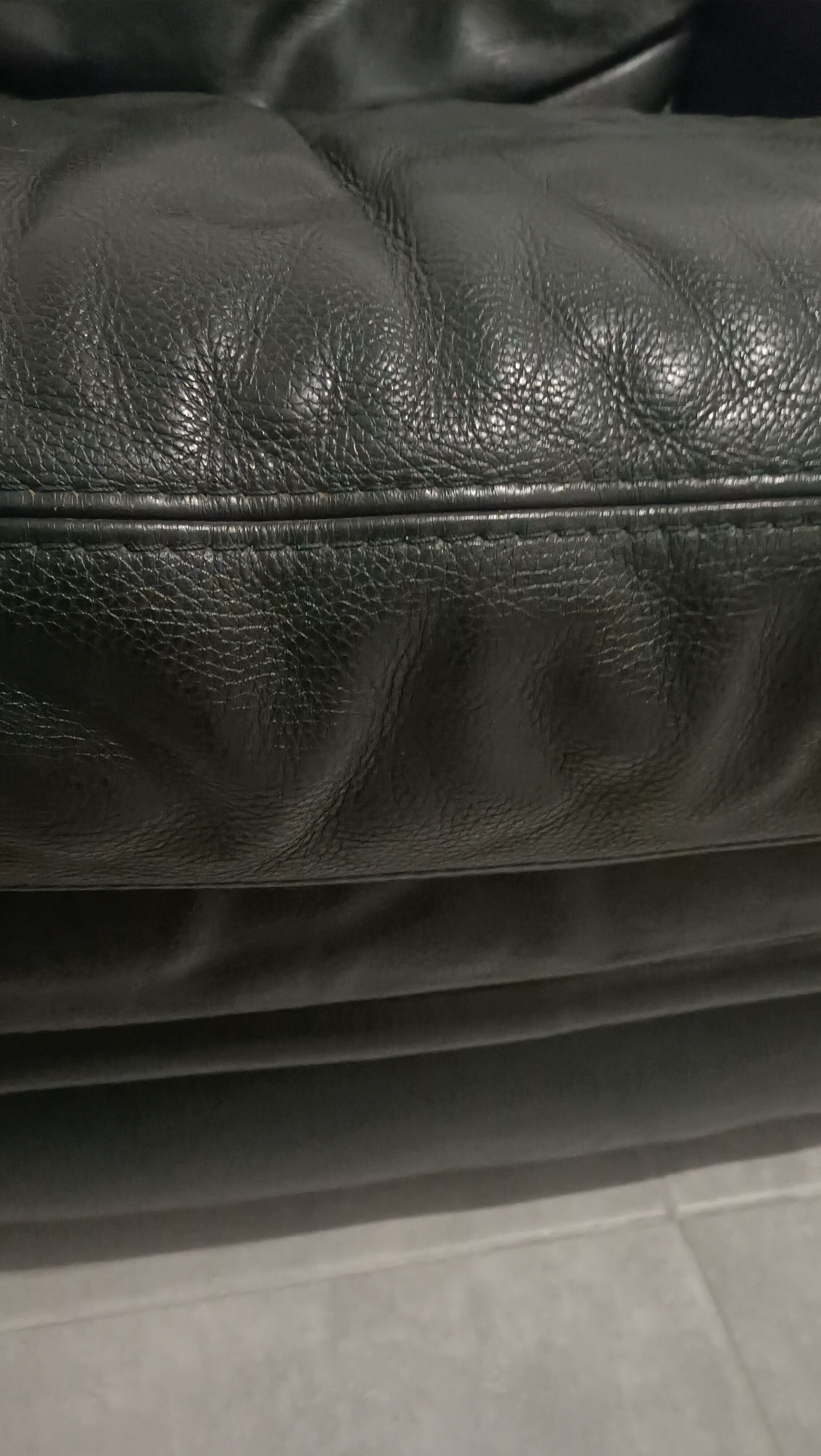 Black leather armchair Natuzzi