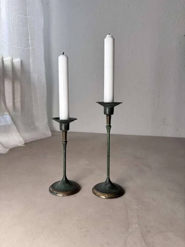 Set of two green bronze Italian candlesticks from the 1980s.