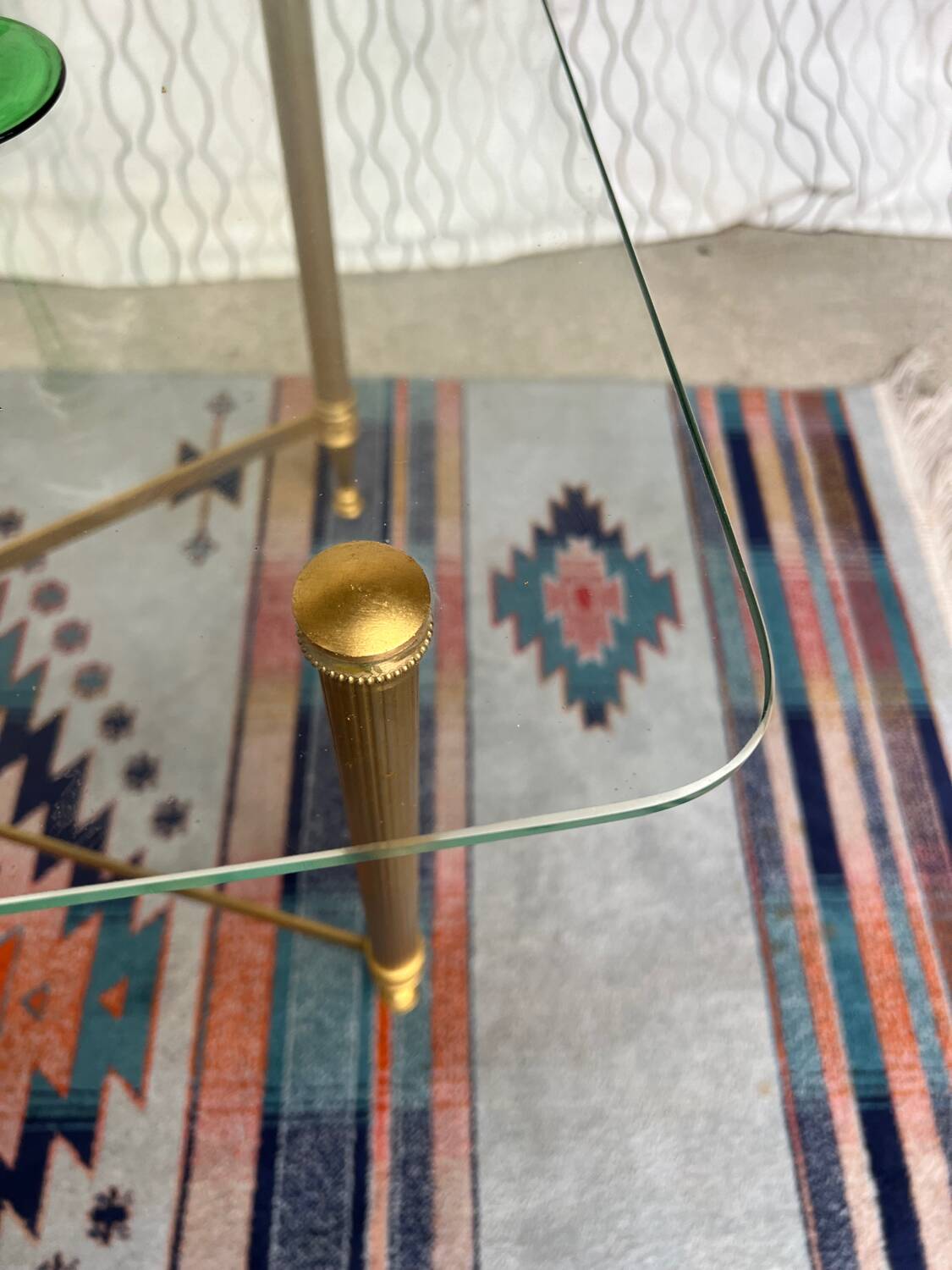 Vintage gold coffee table. Glass top.