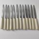 Set of 12 stainless steel and bakelite knives