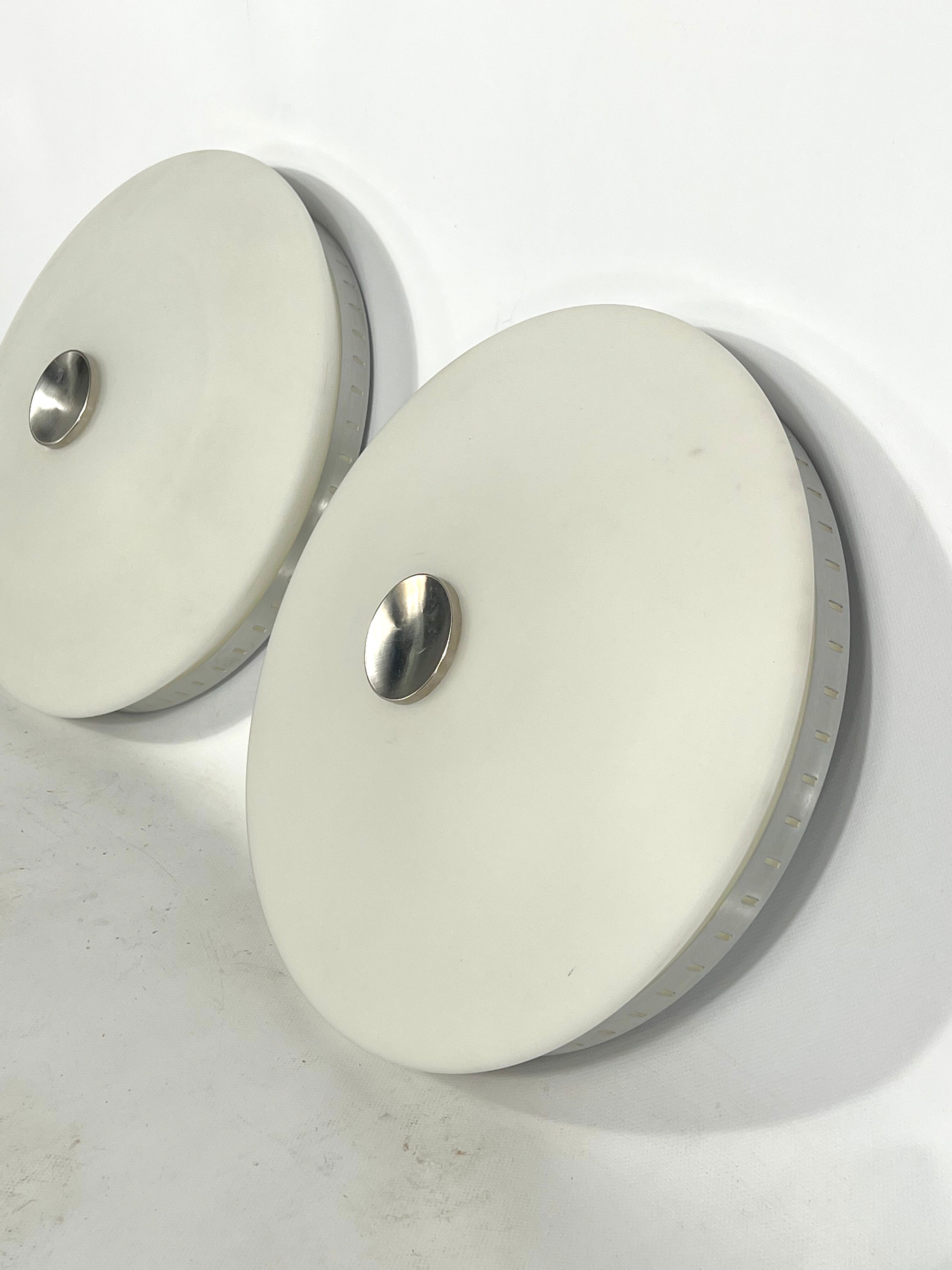 Stilux Milano, pair of round opaline glass ceiling lamps. 1960s