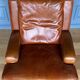 Armchair leather patina brown 1970 surpic roulette