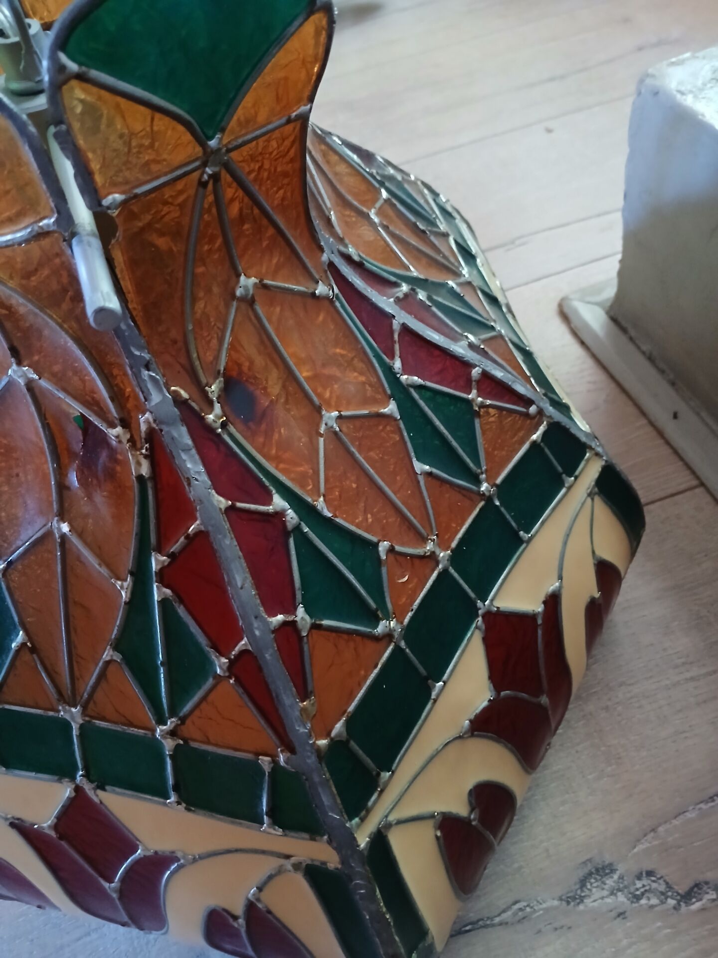 Vintage pendant light with multicoloured stained glass.