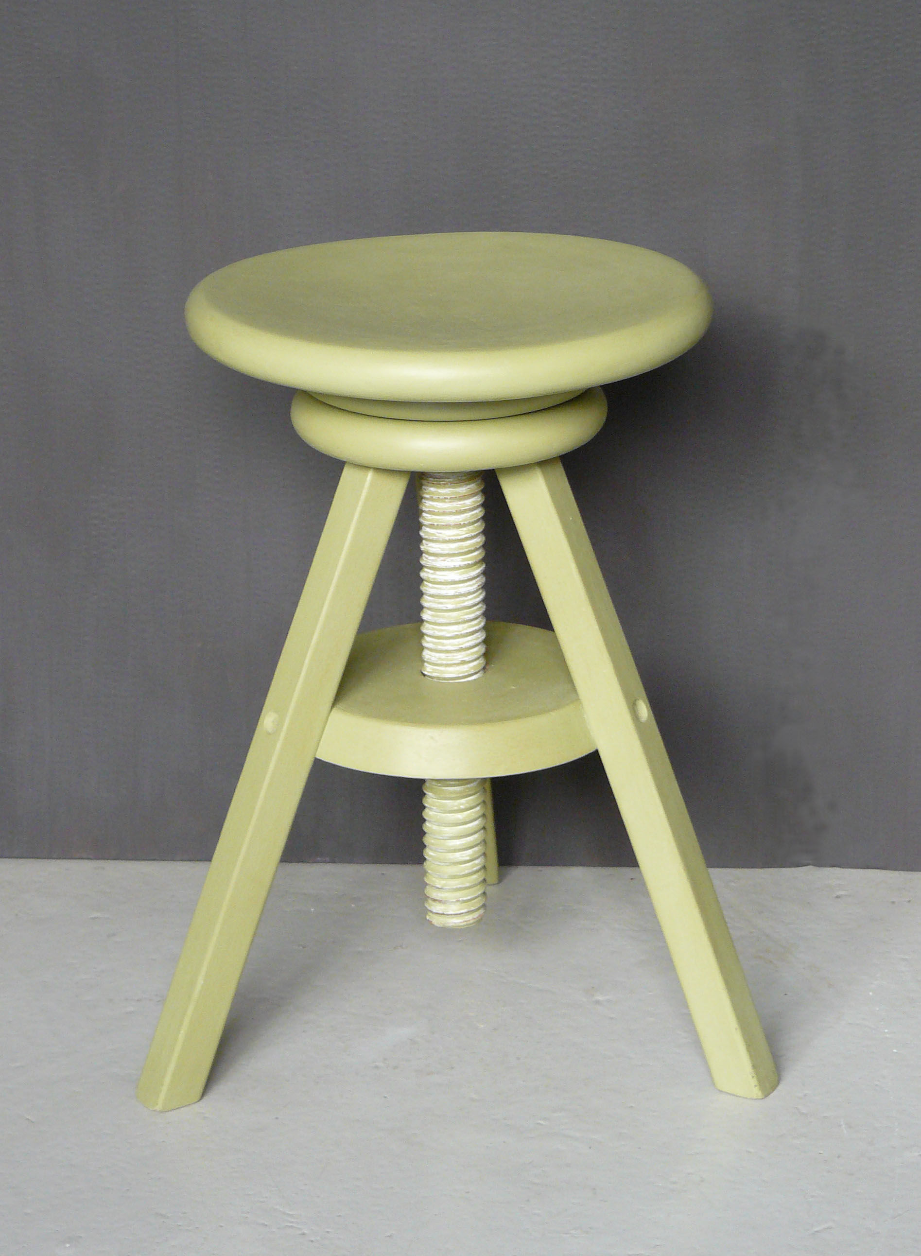 Painted and waxed wooden screw stool