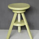 Painted and waxed wooden screw stool