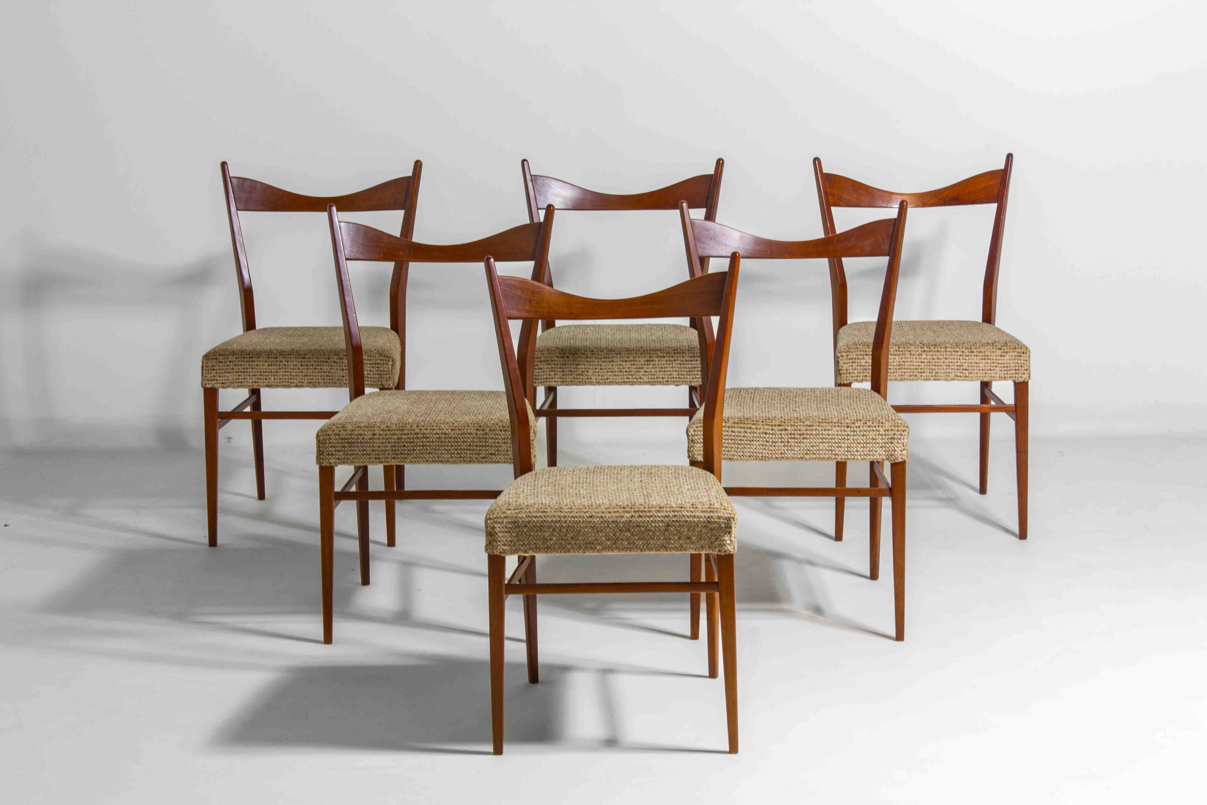 Set of slender mid-century dining chairs with finely curved backs, 1960s