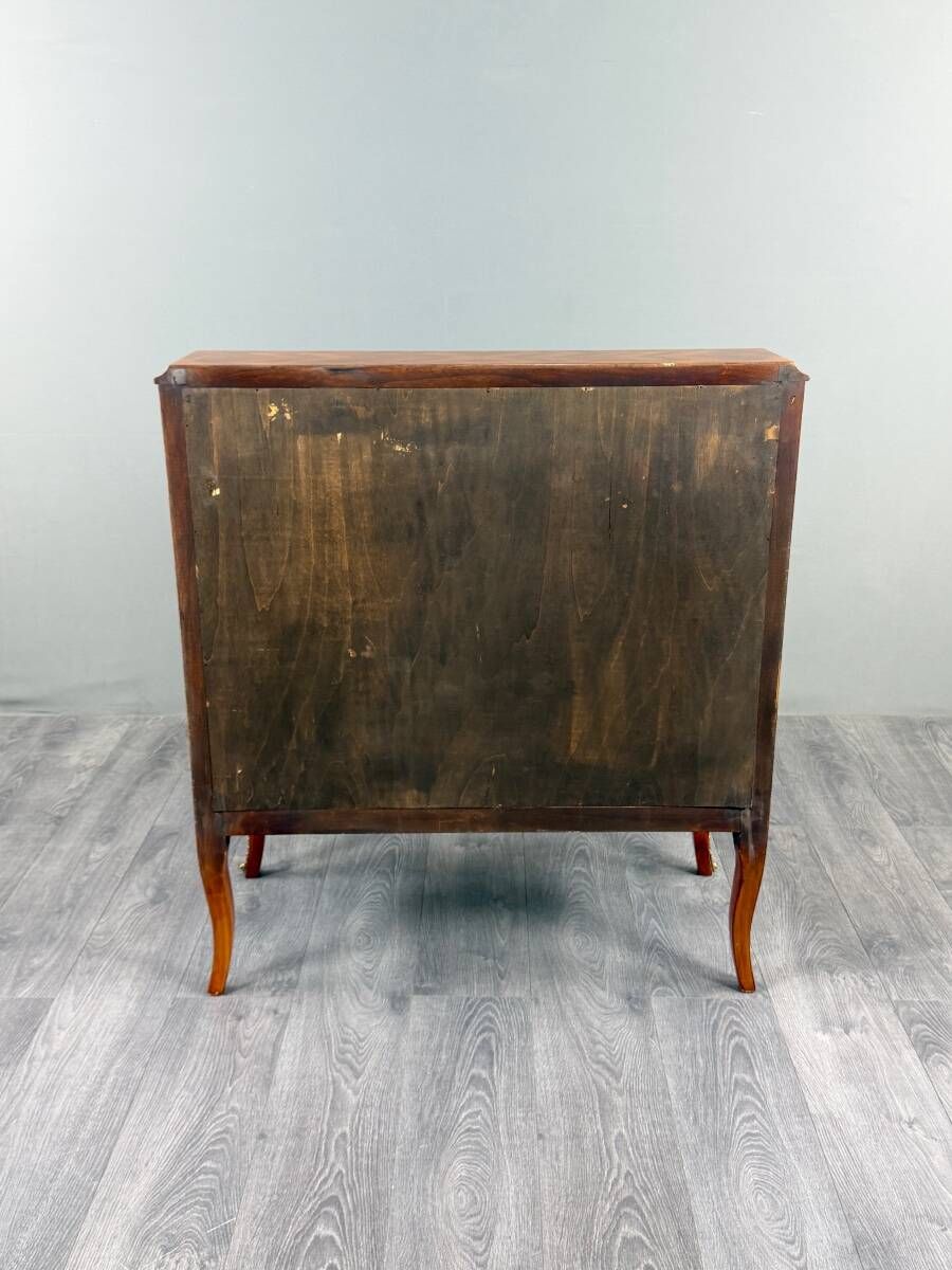 Louis XV style writing desk with a drop-leaf, made of veneer and marquetry, 19th century.