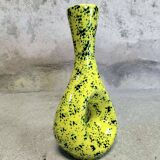 Yellow ceramic vase with green highlights