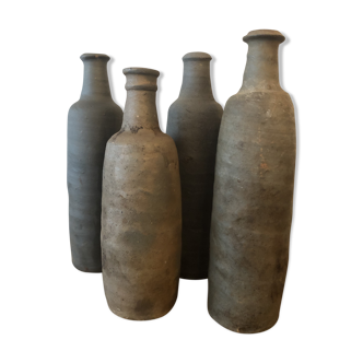 Set of 4 sandstone bottles