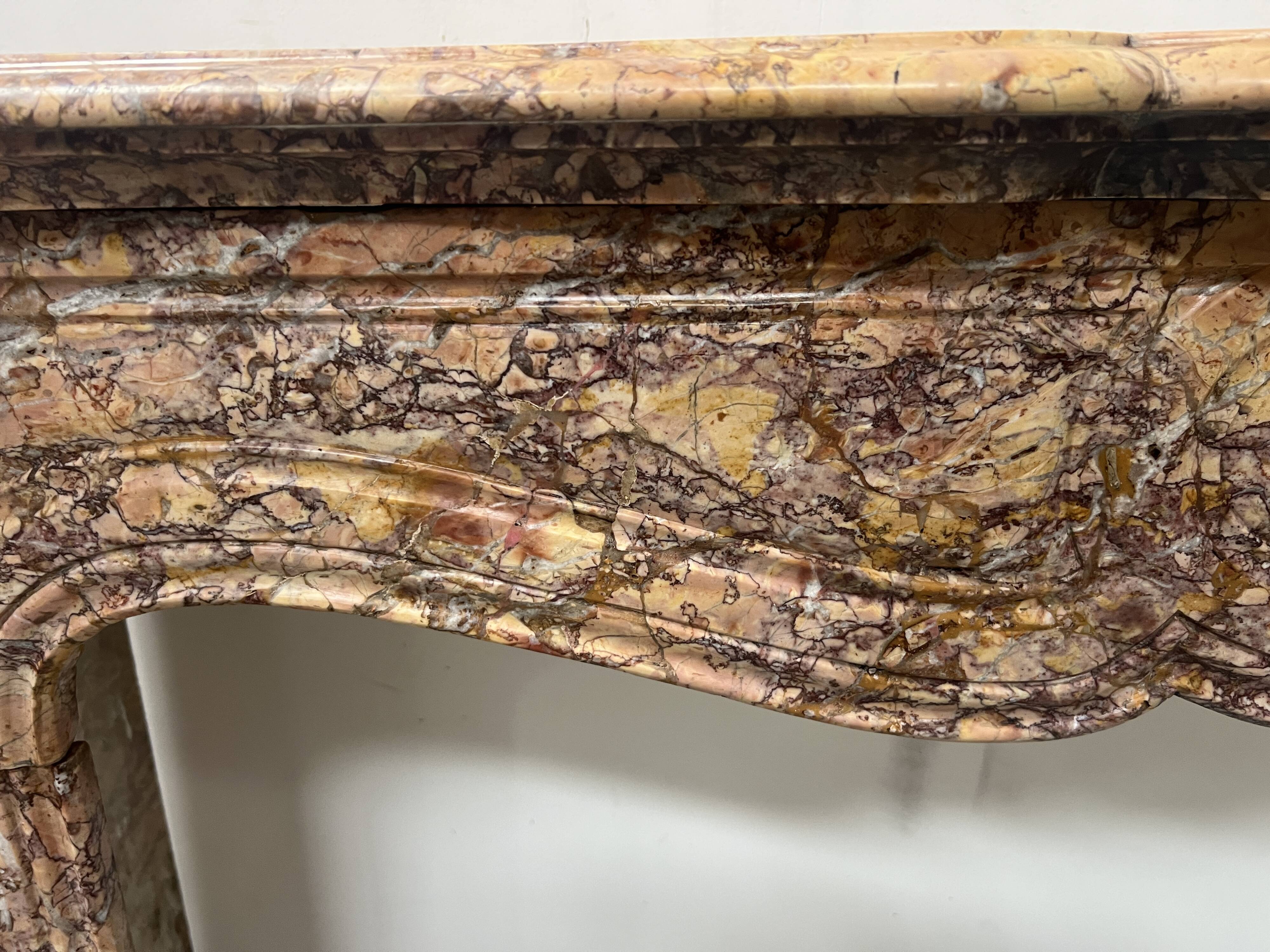 Louis XV style fireplace, Pompadour model, speckled breccia marble, 19th century