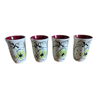 Set of four enameled stoneware glasses