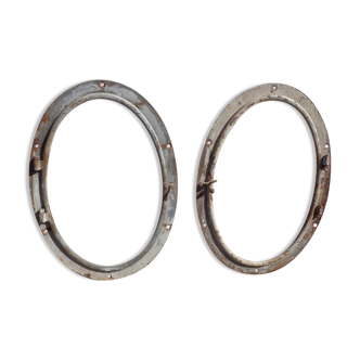 Pair of cast iron bull's eye