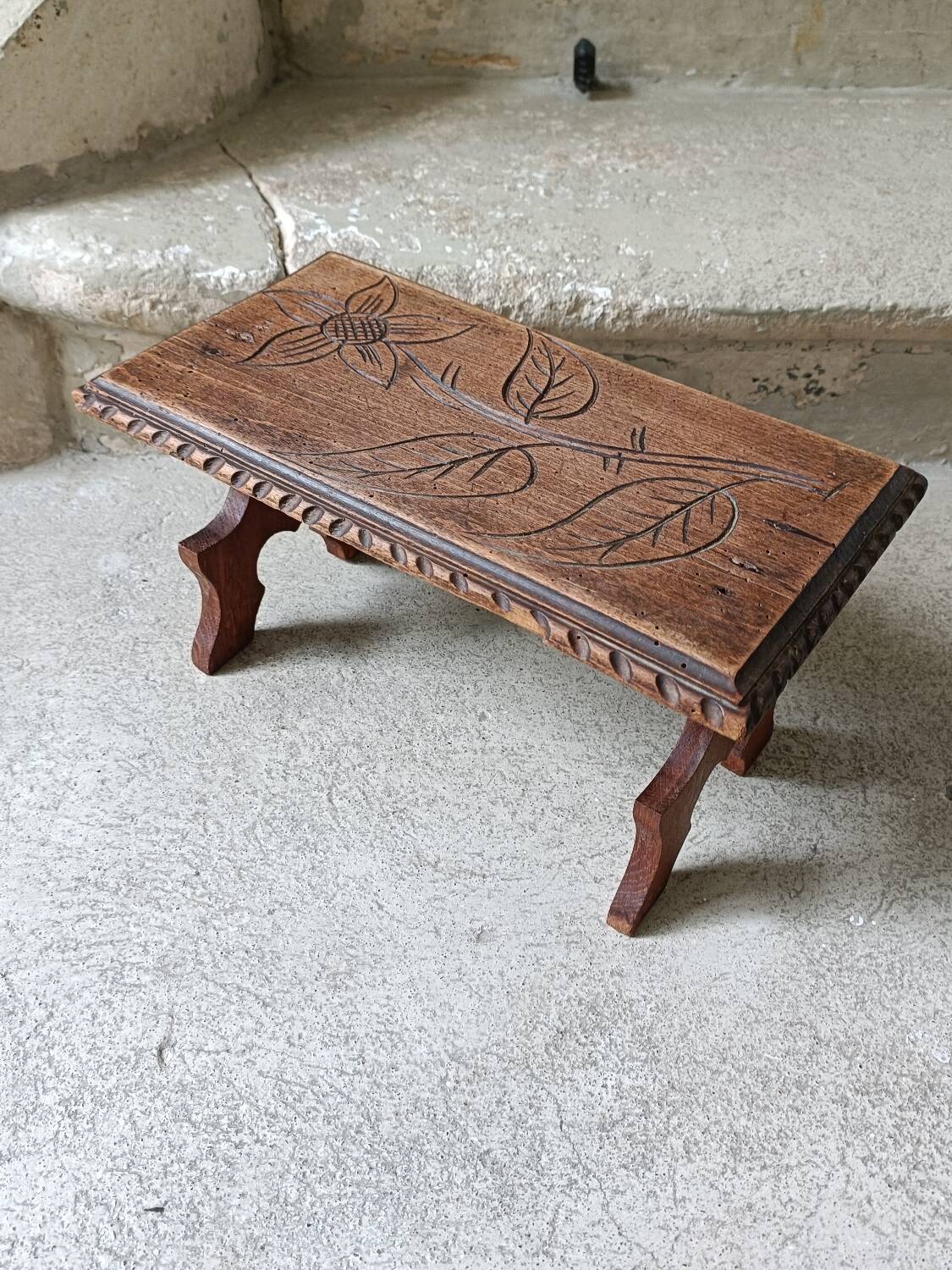 Antique footrest