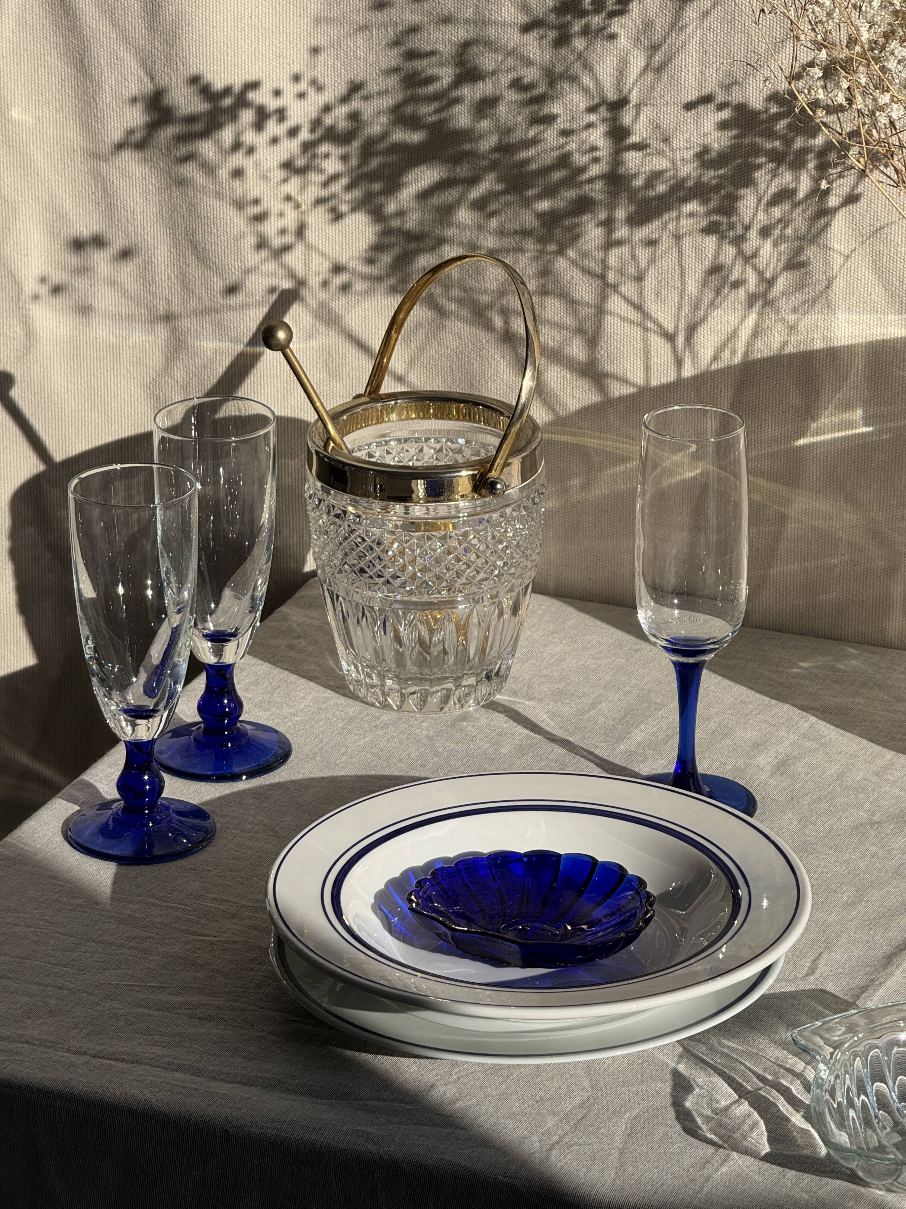 Set of 6 blue-footed champagne flutes; 3 pairs of designs.