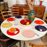 White dining table with tulip base by Maurice Burke