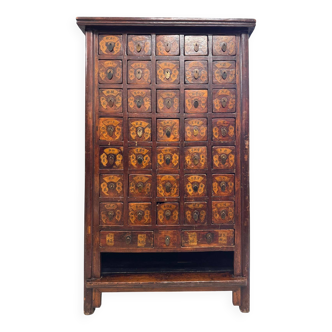 Apothecary cabinet with 38 drawers made of elm wood.