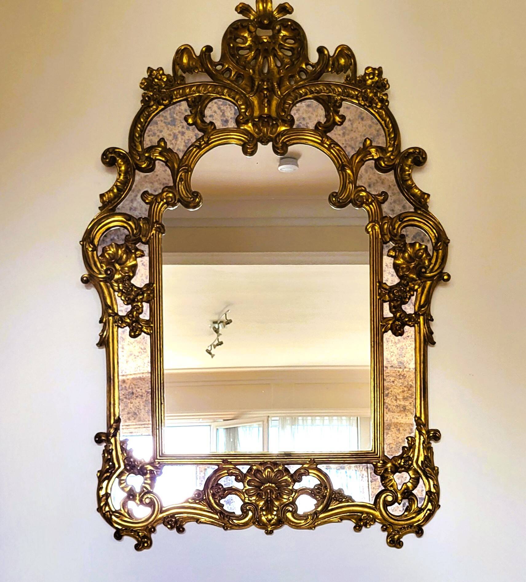 Large Louis XVI style mirror with shutters in perfect condition.