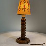 Vintage turned wooden lamp, in the style of Charles Dudouyt.