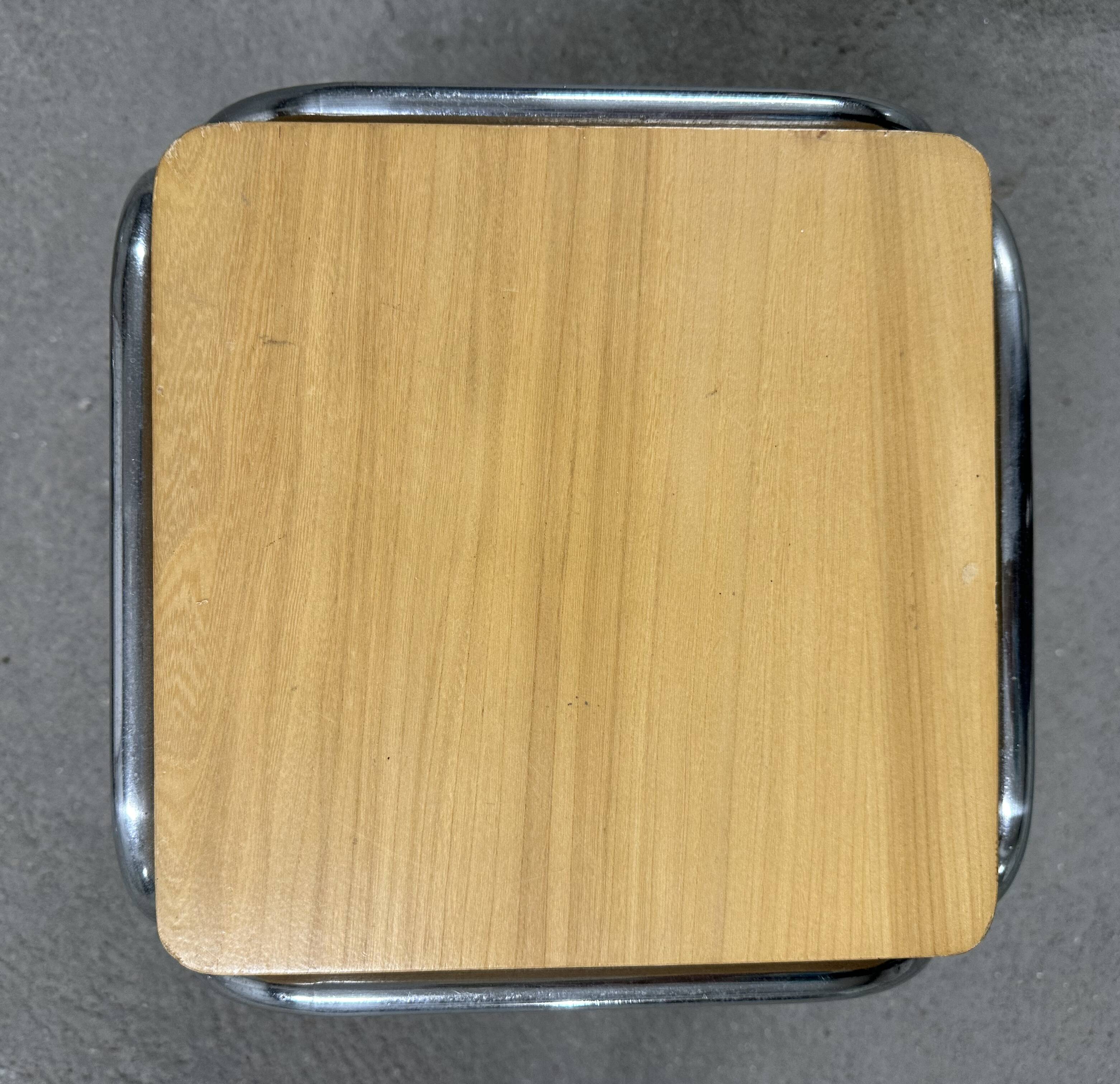 Set of 4 nesting coffee tables from the 70s, metal and solid oak.