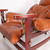 Vintage-style leather and rope armchair and its ottoman