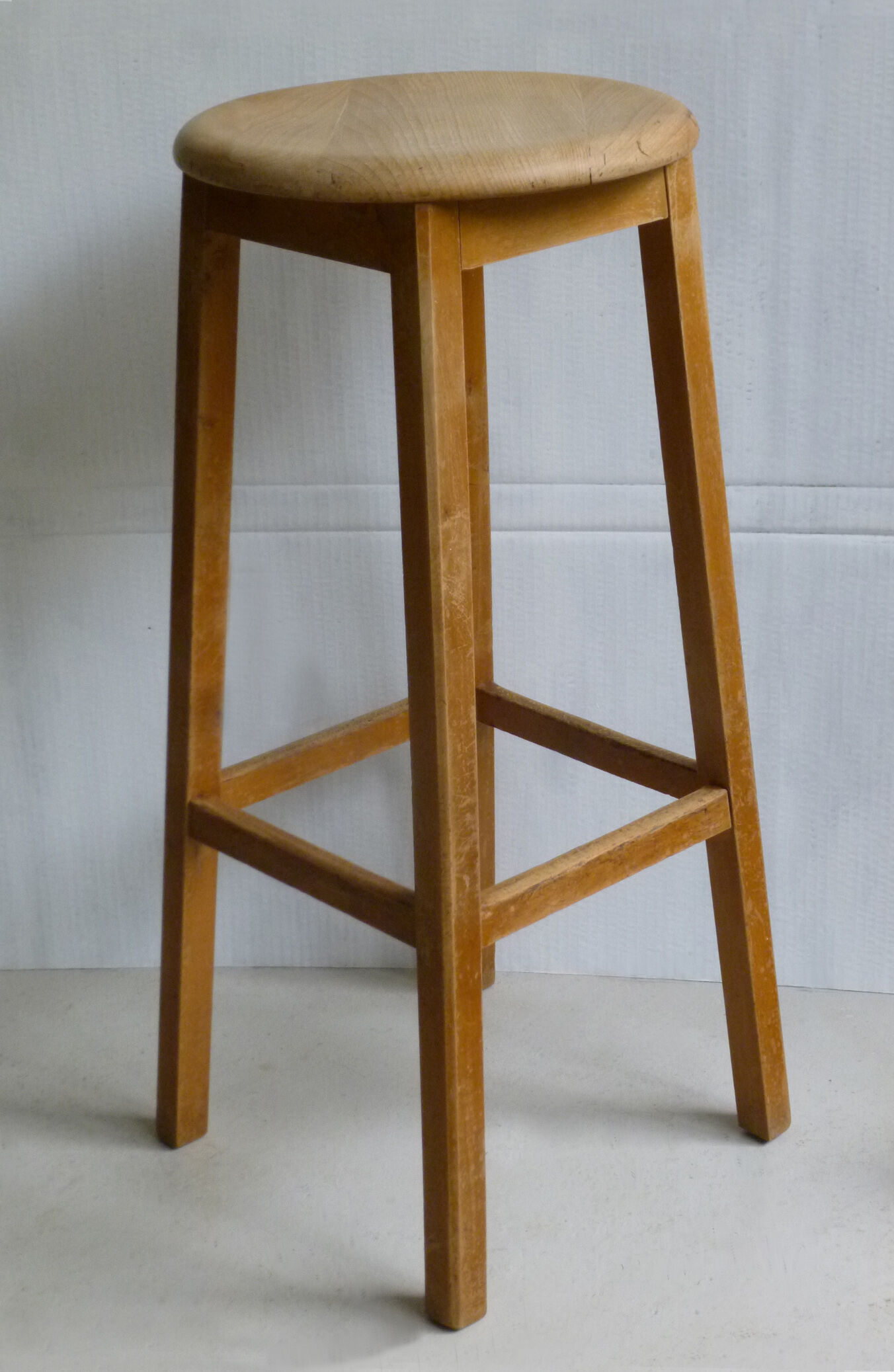 High wooden stool