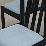 Set of 4 modernist black chairs with light blue ribbed fabric