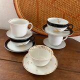 5 tasses à café en blanc , doré et noir