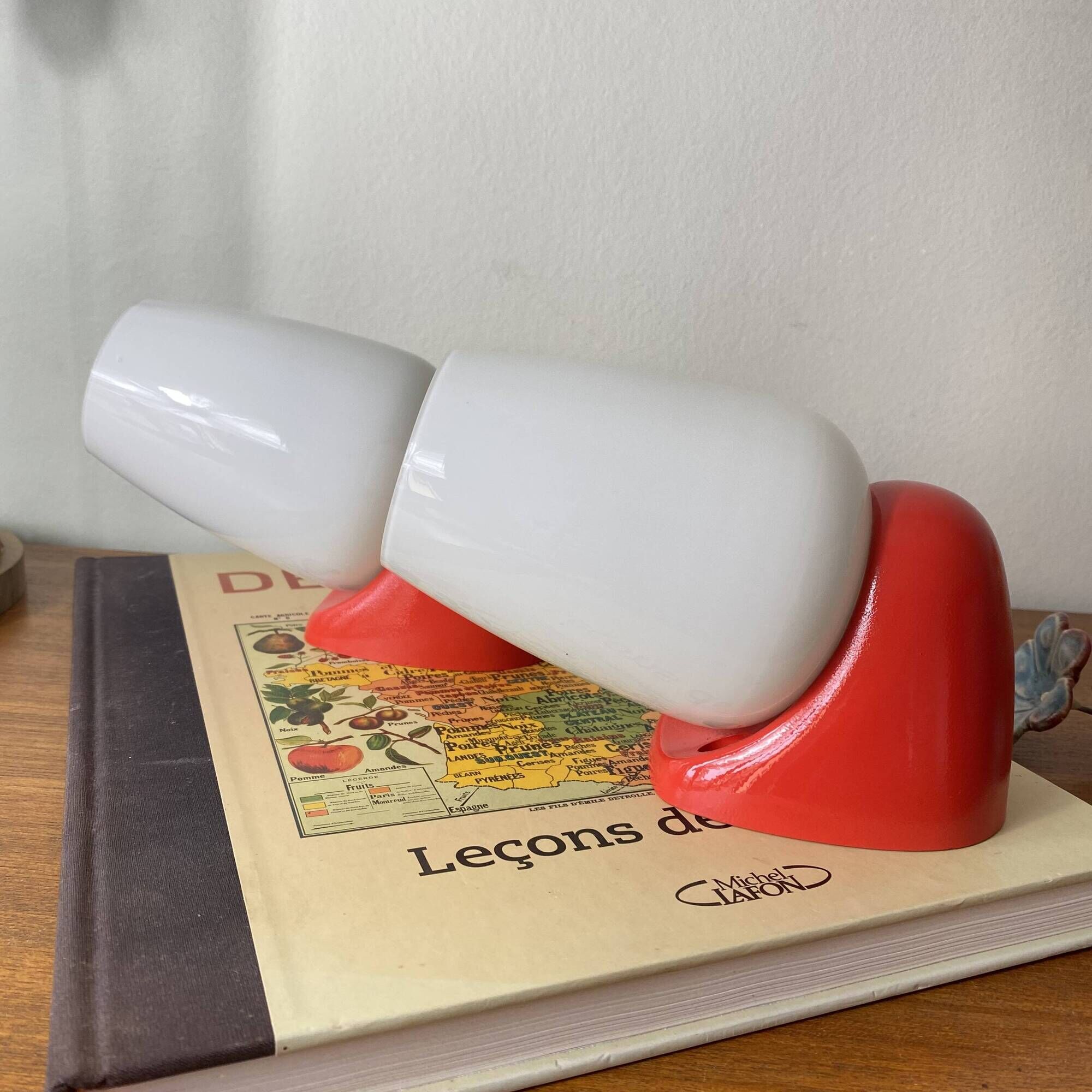Pair of vintage wall lights in plastic and white opaline glass.