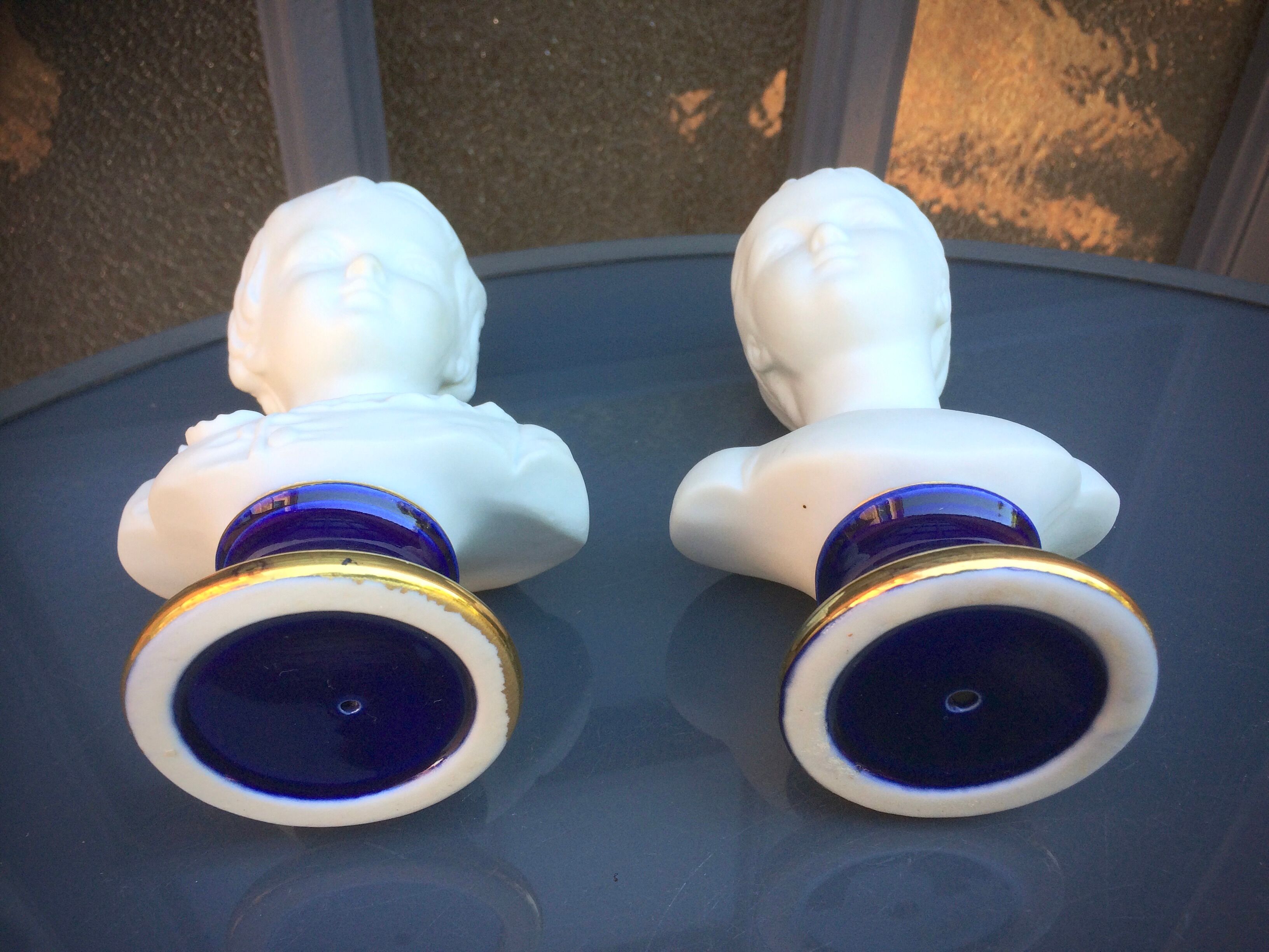 Children's busts in biscuit