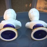 Children's busts in biscuit