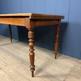 Antique cherry wood dining table from France.