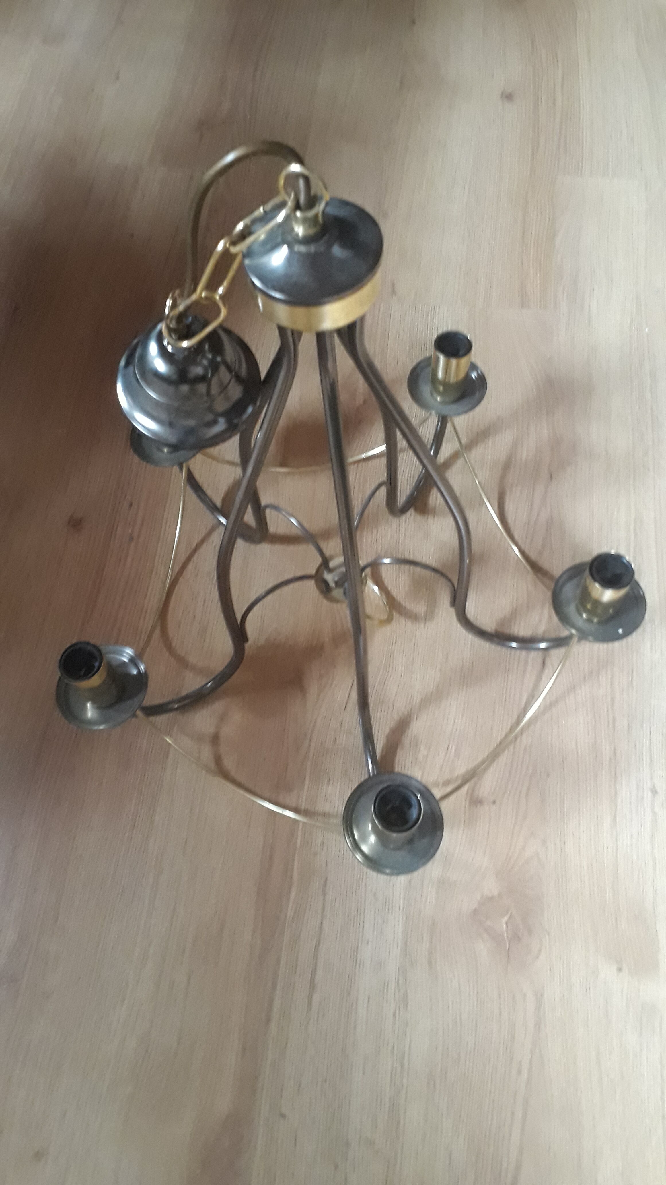 Black chrome chandelier and vintage gold veneer