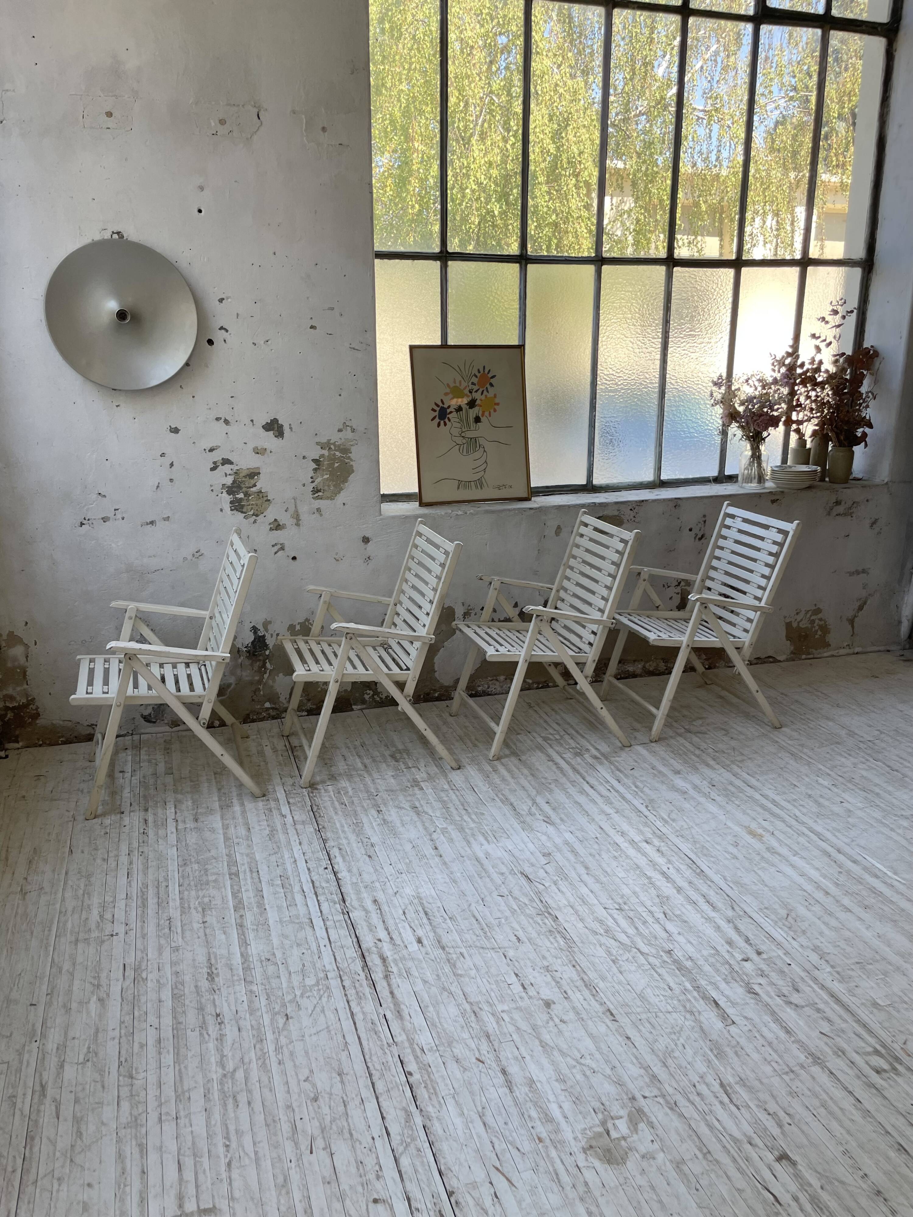 4 white wooden garden chairs