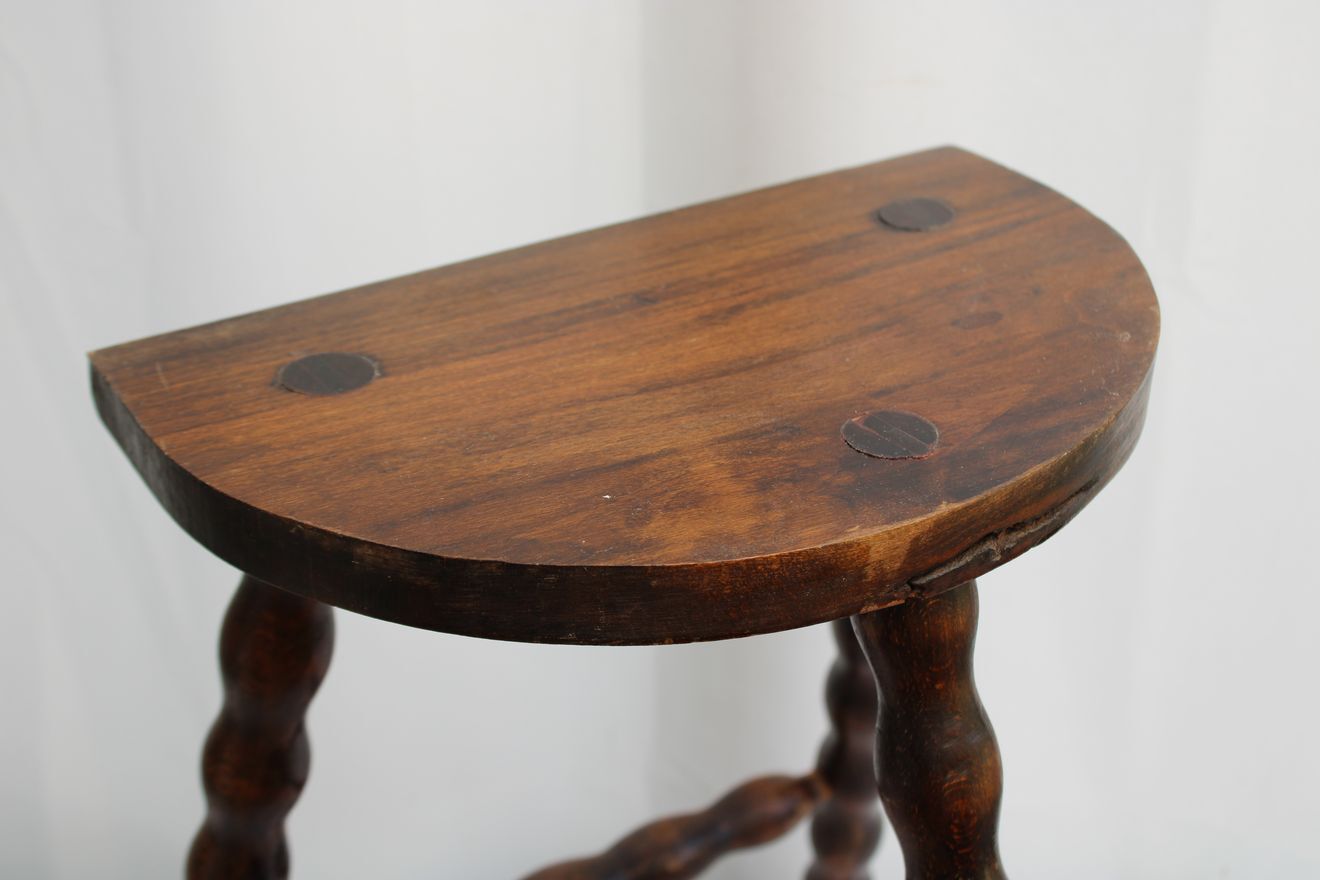 Wooden tripod stool