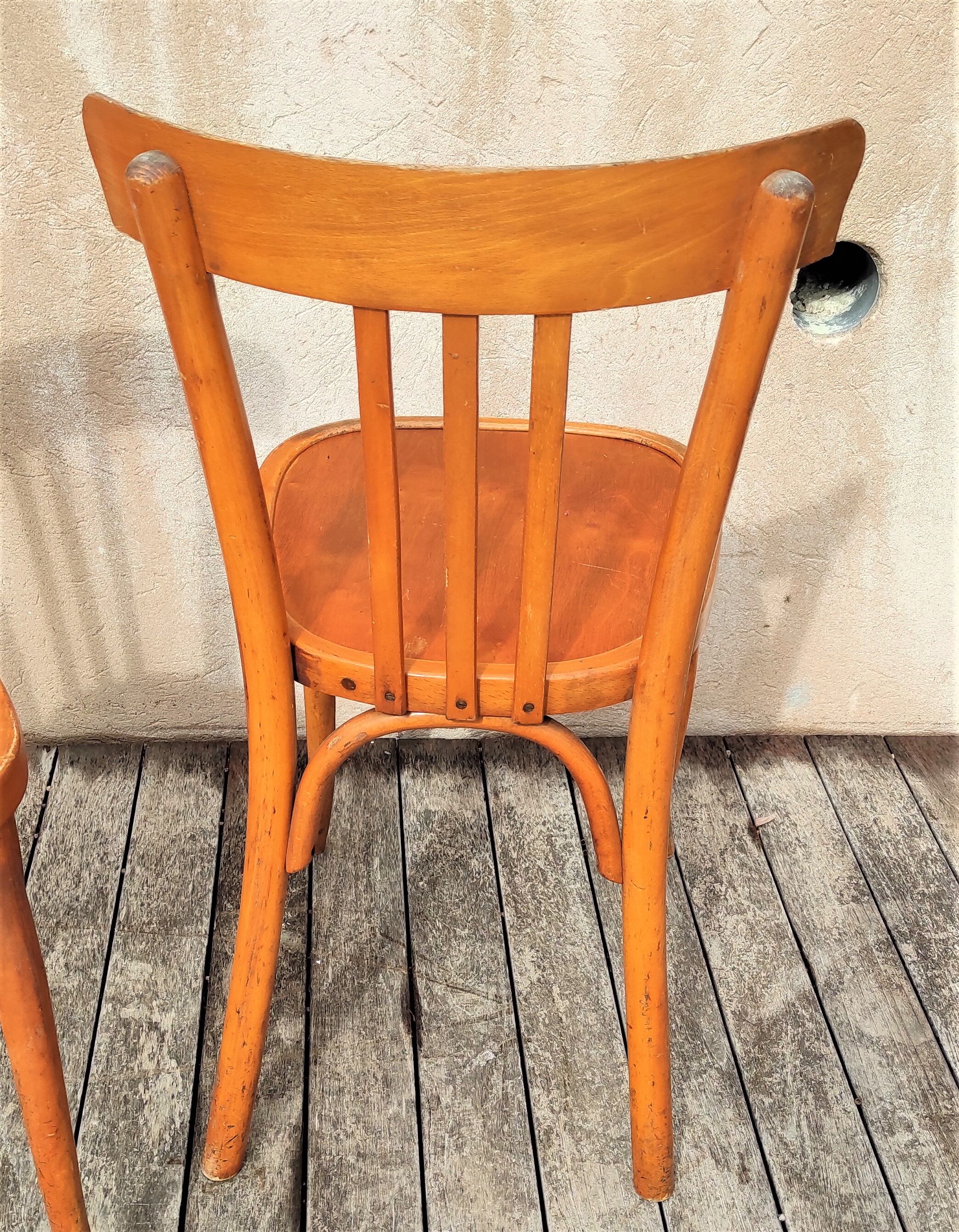 Pair of bistro chairs with bars