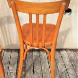 Pair of bistro chairs with bars